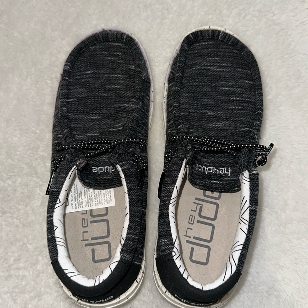 Black and white Hey Dude boys shoes